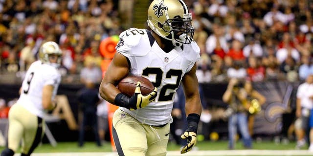 Aug 30, 2015; New Orleans, LA, USA; New Orleans Saints running back Mark Ingram (22) runs against the Houston Texans during the first quarter of a preseason game at the Mercedes-Benz Superdome. Mandatory Credit: Derick E. Hingle-USA TODAY Sports
