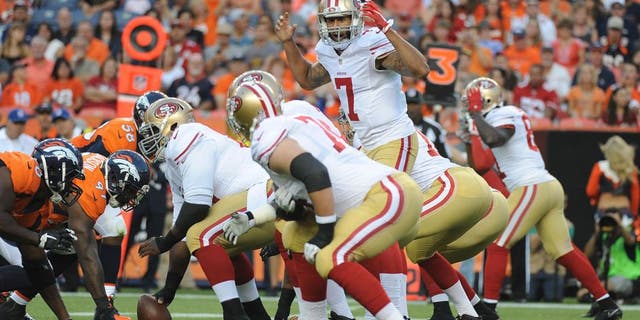 DENVER, CO - AUGUST 29: San Francisco 49ers quarterback Colin Kaepernick in the first half against the Denver Broncos at Sports Authority Field at Mile High on Saturday, August 29, 2015. (Photo by Steve Nehf/The Denver Post via Getty Images)
