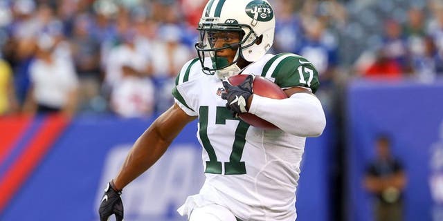 Aug 29, 2015; East Rutherford, NJ, USA; New York Jets wide receiver Chris Owusu (17) returns the opening kickoff during the first half of their game against the New York Giants at MetLife Stadium. Mandatory Credit: Ed Mulholland-USA TODAY Sports
