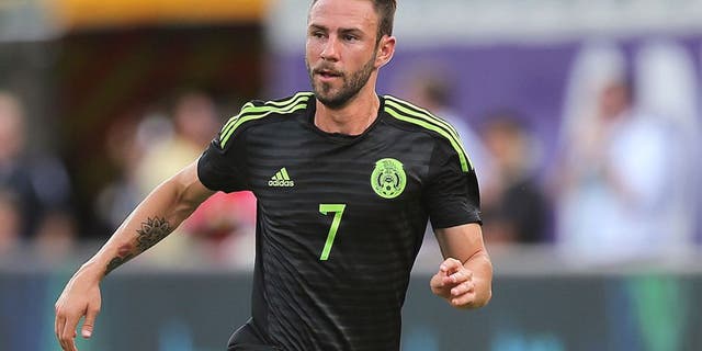 ORLANDO, FL - JUNE 27: Miguel Layun #7 of Mexico dribbles the ball during an international friendly soccer match between Mexico and Costa Rica at the Orlando Citrus Bowl on June 27, 2015 in Orlando, Florida. The game ended in a 2-2 draw. (Photo by Alex Menendez/Getty Images)