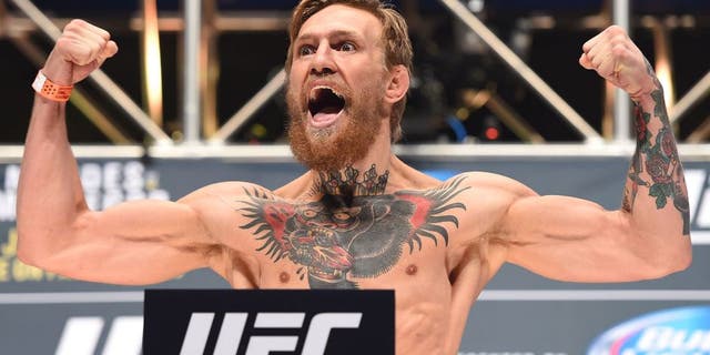 LAS VEGAS, NV - JULY 10: Conor McGregor steps onto the scale during the UFC 189 weigh-in inside MGM Grand Garden Arena on July 10, 2015 in Las Vegas, Nevada. (Photo by Josh Hedges/Zuffa LLC/Zuffa LLC via Getty Images)