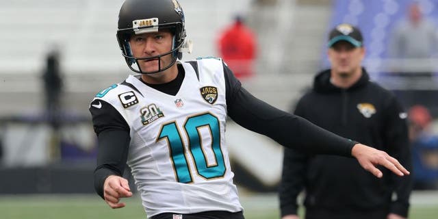 Dec 14, 2014; Baltimore, MD, USA; Jacksonville Jaguars kicker Josh Scobee (10) warms up prior to the game against the Baltimore Ravens at M&T Bank Stadium. Mandatory Credit: Mitch Stringer-USA TODAY Sports