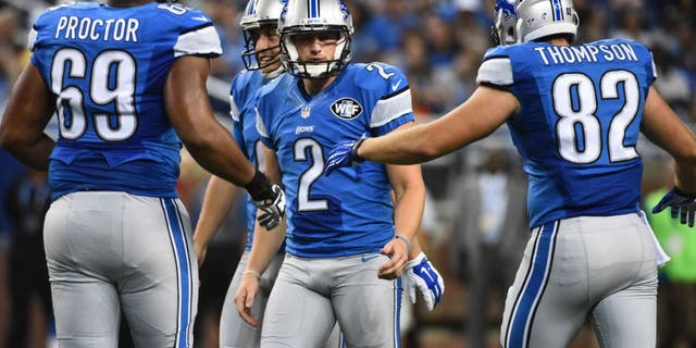 Aug 13, 2015; Detroit, MI, USA; Detroit Lions kicker Kyle Brindza (2) is congratulated by teammates after a field goal during the third quarter against the New York Jets in a preseason NFL football game at Ford Field. Mandatory Credit: Tim Fuller-USA TODAY Sports