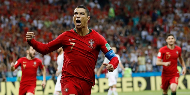 Portugal's Cristiano Ronaldo celebrates his side's opening goal during the group B match between Portugal and Spain at the 2018 soccer World Cup in Sochi, Russia, Friday, June 15, 2018. (AP Photo/Francisco Seco)