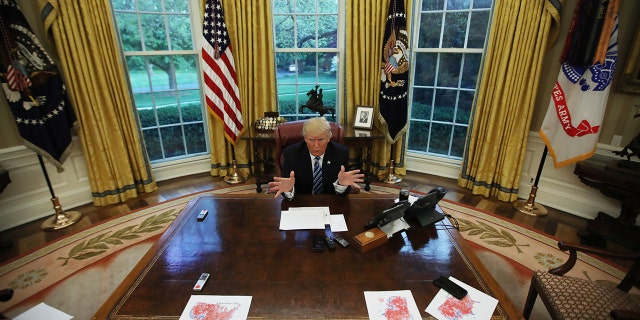 U.S. President Donald Trump speaks during an interview with Reuters in the Oval Office of the White House in Washington, U.S., April 27, 2017. REUTERS/Carlos Barria TPX IMAGES OF THE DAY - HP1ED4S02VJ7Y