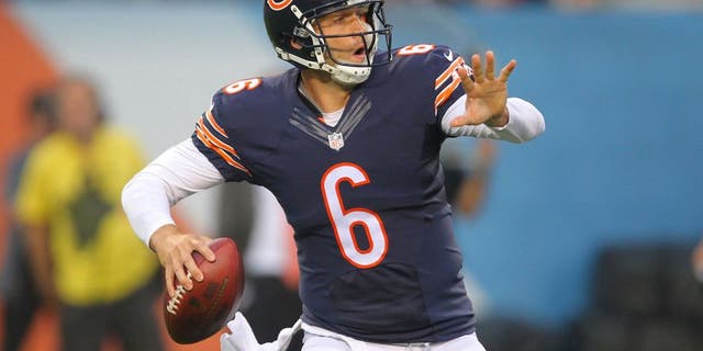 Aug 8, 2014; Chicago, IL, USA; Chicago Bears quarterback Jay Cutler (6) throws a pass during the first quarter of a preseason game against the Philadelphia Eagles at Soldier Field. Mandatory Credit: Dennis Wierzbicki-USA TODAY Sports
