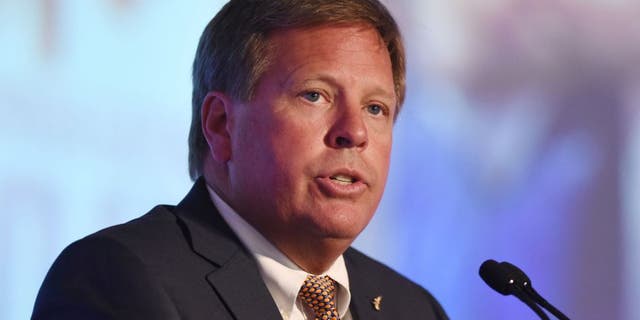 Jul 13, 2015; Hoover, AL, USA; Florida Gators football coach Jim McElwain fields questions during SEC media days at the Wynfrey Hotel. Mandatory Credit: Kelly Lambert-USA TODAY Sports