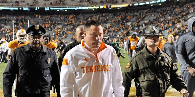 Nov 22, 2014; Knoxville, TN, USA; Tennessee Volunteers head coach Butch Jones leaves the field after his team lost to the Missouri Tigers during the second half at Neyland Stadium. Missouri won 29-21. Mandatory Credit: Jim Brown-USA TODAY Sports