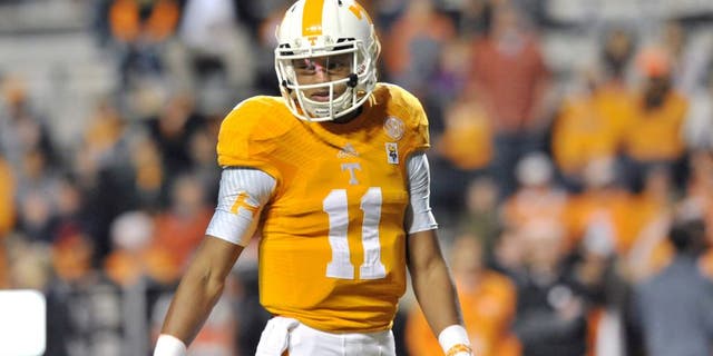 Nov 22, 2014; Knoxville, TN, USA; Tennessee Volunteers quarterback Joshua Dobbs (11) during warm ups prior to the game against the Missouri Tigers at Neyland Stadium. Mandatory Credit: Jim Brown-USA TODAY Sports