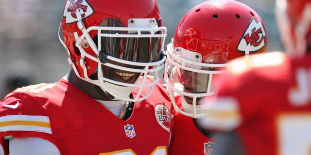 Sep 8, 2013; Jacksonville, FL, USA; Kansas City Chiefs outside linebacker Tamba Hali (91) reacts after running an interception back for a touchdown during the game against the Jacksonville Jaguars at EverBank Field. Mandatory Credit: Rob Foldy-USA TODAY Sports