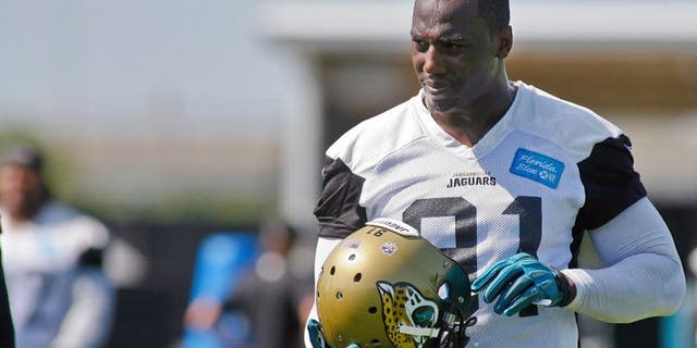 Jun 16, 2015; Jacksonville, FL, USA; Jacksonville Jaguars defensive end Chris Clemons (91) during minicamp at the Florida Blue Health and Wellness Practice Fields. Mandatory Credit: Phil Sears-USA TODAY Sports
