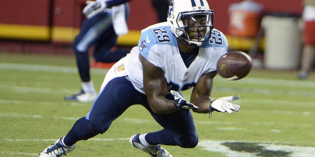 Aug 28, 2015; Kansas City, MO, USA; Tennessee Titans defensive back Perrish Cox (29) intercepts a pass against the Kansas City Chiefs in the first half at Arrowhead Stadium. Mandatory Credit: John Rieger-USA TODAY Sports