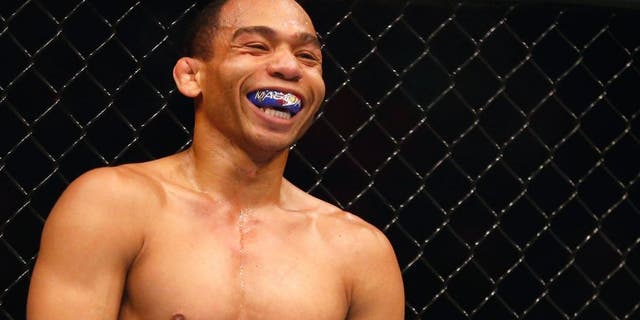 LAS VEGAS, NV - MAY 23: John Dodson laughs in between rounds during the UFC 187 event at the MGM Grand Garden Arena on May 23, 2015 in Las Vegas, Nevada. (Photo by Christian Petersen/Zuffa LLC/Zuffa LLC via Getty Images)