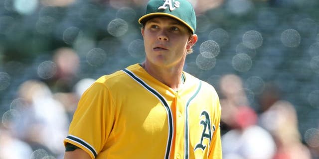 Sep 2, 2015; Oakland, CA, USA; Oakland Athletics starting pitcher Sonny Gray (54) returns to the dugout after the top of the fourth inning against the Los Angeles Angels at O.co Coliseum. Mandatory Credit: Kelley L Cox-USA TODAY Sports