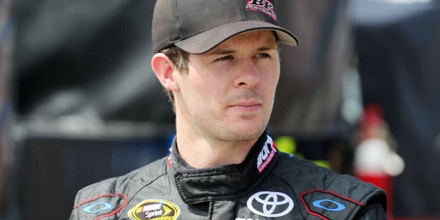 USA -Sep 5: Ryan Truex, driver of the #83 Burger King Toyota Camry, walks through the garage area during practice for the NASCAR Sprint Cup Series Federated Auto Parts 400 at the Richmond International Raceway in Richmond, VA. Picture taken on Sep 5, 2014 in the United States. (Photo by Jim Fluharty/NASCAR Illustrated/Sporting News via Getty Images)
