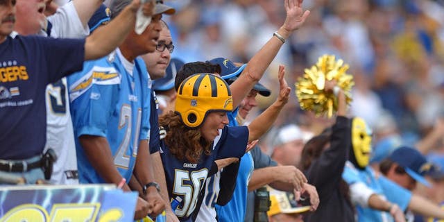 Nov 23, 2014; San Diego, CA, USA; San Diego Chargers fans cheer against the St. Louis Rams during the fourth quarter at Qualcomm Stadium. Mandatory Credit: Jake Roth-USA TODAY Sports
