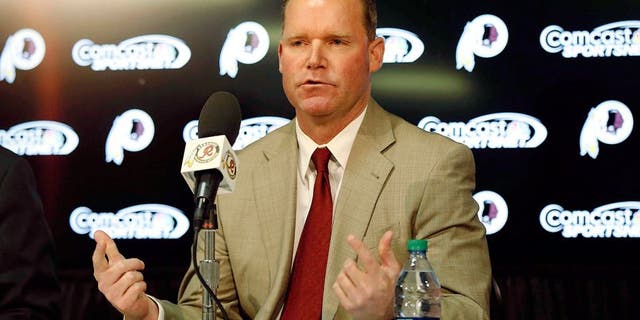 Jan 9, 2015; Ashburn, VA, USA; Washington Redskins new general manager Scot McCloughan (right) speaks during his introductory press conference at Redskins Park. Mandatory Credit: Geoff Burke-USA TODAY Sports