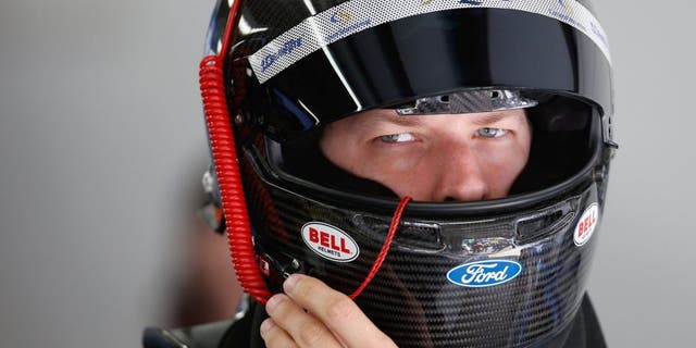 LOUDON, NH - SEPTEMBER 26: Brad Keselowski, driver of the #2 Miller Lite Ford, prepares his equipment in the garage area during practice for the NASCAR Sprint Cup Series Sylvania 300 at New Hampshire Motor Speedway on September 26, 2015 in Loudon, New Hampshire. (Photo by Todd Warshaw/NASCAR via Getty Images)