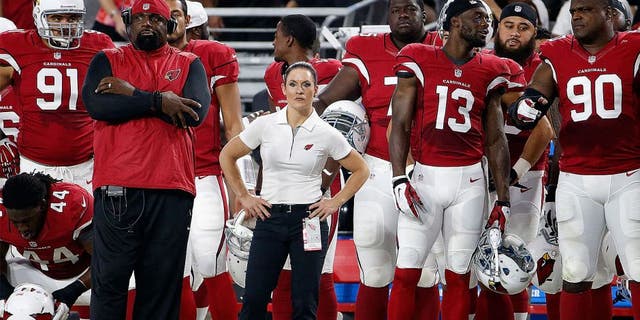 GLENDALE, AZ - AUGUST 15: Intern linebacker coach Jen Welter (C) of the Arizona Cardinals watches from the sidelines during the pre-season NFL game against the Kansas City Chiefs at the University of Phoenix Stadium on August 15, 2015 in Glendale, Arizona. The Chiefs defeated the Cardinals 34-19. (Photo by Christian Petersen/Getty Images)
