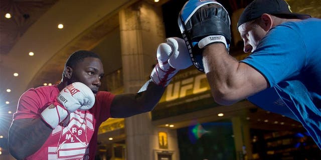 LAS VEGAS, NEVADA - MAY 20: Anthony Johnson (L) holds an open training session for fans and media at the MGM Grand Hotel/Casino on May 20, 2015 in Las Vegas Nevada. (Photo by Brandon Magnus/Zuffa LLC/Zuffa LLC via Getty Images)