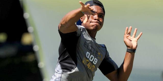 June 30, 2013; Beaverton, OR, USA; Jerrod Heard, of Denton, Texas, passes the ball during the morning session of the Elite 11 at Nike World Headquarters. Mandatory Credit: Steve Dykes-USA TODAY Sports