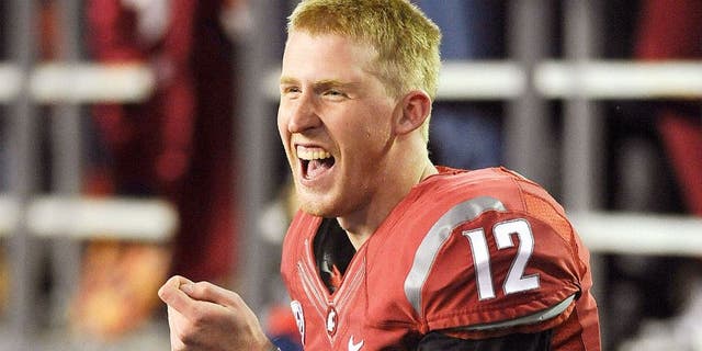 Oct 12, 2013; Pullman, WA, USA; Washington State Cougars quarterback Connor Halliday (12) reacts during the second half against the Oregon State Beavers at Martin Stadium. The Beavers beat the Cougars 52-24. Mandatory Credit: James Snook-USA TODAY Sports
