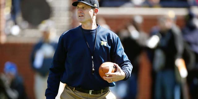 ANN ARBOR, MI - APRIL 04: Head coach Jim Harbaugh of the Michigan Wolverines looks on during the Michigan Football Spring Game on April 4, 2015 at Michigan Stadium in Ann Arbor, Michigan. (Photo by Gregory Shamus/Getty Images)