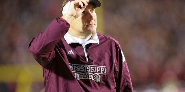 Nov 29, 2014; Oxford, MS, USA; Mississippi State Bulldogs head coach Dan Mullen looks on against the Mississippi Rebels at Vaught-Hemingway Stadium. The Rebels won 31-17. Mandatory Credit: Spruce Derden-USA TODAY Sports