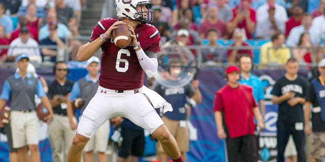 Sep 3, 2015; Charlotte, NC, USA; South Carolina Gamecocks quarterback Connor Mitch (6) looks to pass the ball during the second quarter against the North Carolina Tar Heels at Bank of America Stadium. Mandatory Credit: Joshua S. Kelly-USA TODAY Sports