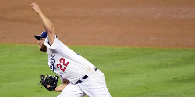 LOS ANGELES, CA - SEPTEMBER 02: Clayton Kershaw #22 of the Los Angeles Dodgers pitches in the ninth inning to a complete game 2-1 victory over the San Francisco Giants at Dodger Stadium on September 2, 2015 in Los Angeles, California. (Photo by Harry How/Getty Images)