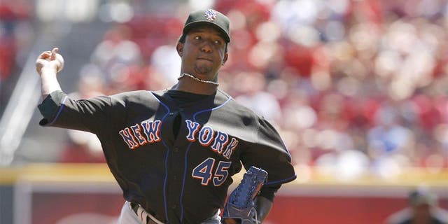 CINCINNATI - SEPTEMBER 3: Pitcher Pedro Martinez #45 of the New York Mets pitches against the Cincinnati Reds on September 3, 2007 at Great American Ball Park in Cincinnati, Ohio. Pedro Martinez recorded his 3000th strikeout during this game. (Photo by Thomas E. Witte/Getty Images)