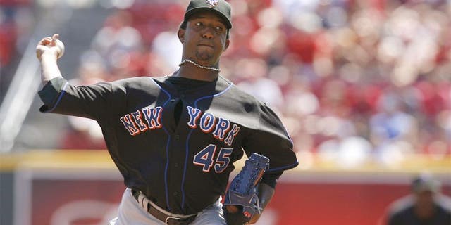 CINCINNATI - SEPTEMBER 3: Pitcher Pedro Martinez #45 of the New York Mets pitches against the Cincinnati Reds on September 3, 2007 at Great American Ball Park in Cincinnati, Ohio. Pedro Martinez recorded his 3000th strikeout during this game. (Photo by Thomas E. Witte/Getty Images)
