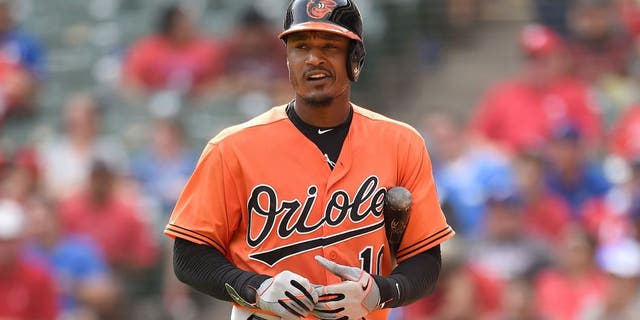 ARLINGTON, TX - AUGUST 30: Adam Jones #10 of the Baltimore Orioles looks off the field at the crowd as he walks back to the dugout after striking out in the game against the Texas Rangers at Globe Life Park in Arlington on August 30, 2015 in Arlington, Texas. The Texas Rangers defeated the Baltimore Orioles 6-0. (Photo by John Williamson/MLB Photos via Getty Images)
