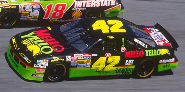 Dale Jarrett drives his Interstate Batteries #18 car down a turn against Kyle Petty in his Mello Yello #42 car during the Daytona 500 at the Daytona Speedway on February 14, 1993 in Daytona Beach, Florida. (Photo by Focus on Sport/Getty Images)