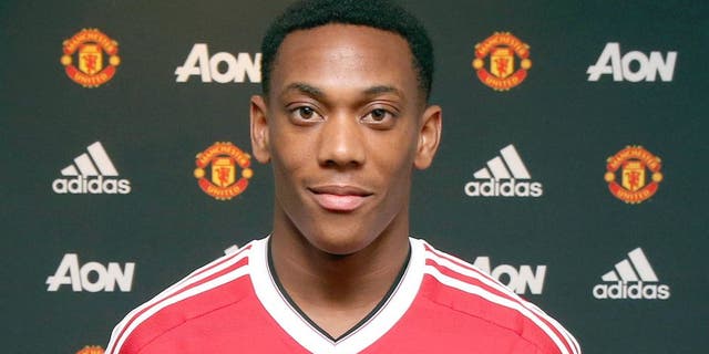 MANCHESTER, ENGLAND - SEPTEMBER 01: (EXCLUSIVE COVERAGE) (MINIMUM FEES APPLY - 150 GBP PRINT AND ON AIR & 75 GBP ONLINE OR LOCAL EQUIVALENT, PER IMAGE) Manchester United unveil new signing Anthony Martial at Aon Training Complex on September 1, 2015 in Manchester, England. (Photo by John Peters/Man Utd via Getty Images)