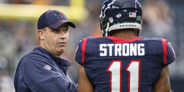 Aug 22, 2015; Houston, TX, USA; Houston Texans head coach Bill O'Brien talks with wide receiver Jaelen Strong (11) before a game against the Denver Broncos at NRG Stadium. Mandatory Credit: Troy Taormina-USA TODAY Sports