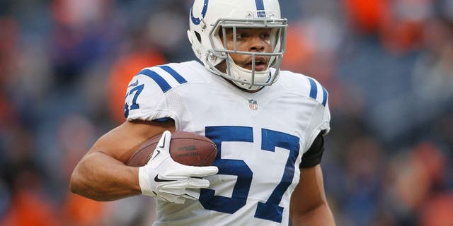 Jan 11, 2015; Denver, CO, USA; Indianapolis Colts outside linebacker Josh McNary (57) in the 2014 AFC Divisional playoff football game against the Denver Broncos at Sports Authority Field at Mile High. Mandatory Credit: Chris Humphreys-USA TODAY Sports