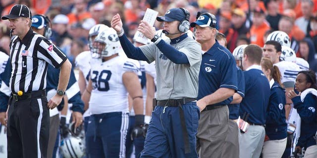 Oct 15, 2011; Corvallis, OR, USA; Brigham Young Cougars head coach Bronco Mendenhall calls his team over during the second half against the Oregon State Beavers at Reser Stadium. Mandatory Credit: Jim Z. Rider-USA TODAY Sports.