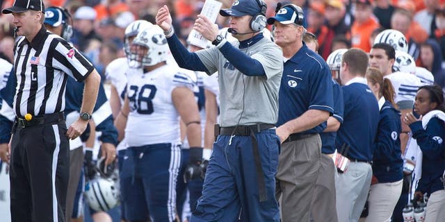 Oct 15, 2011; Corvallis, OR, USA; Brigham Young Cougars head coach Bronco Mendenhall calls his team over during the second half against the Oregon State Beavers at Reser Stadium. Mandatory Credit: Jim Z. Rider-USA TODAY Sports.