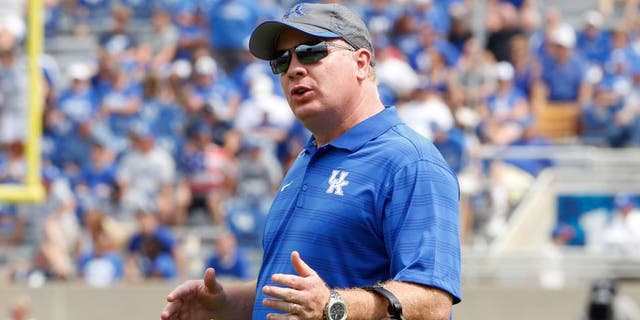 Aug 30, 2014; Lexington, KY, USA; Kentucky Wildcats head coach Mark Stoops reacts during the game against the UT Martin Skyhawks in the second half at Commonwealth Stadium. Kentucky defeated UT Martin 59-14. Mandatory Credit: Mark Zerof-USA TODAY Sports