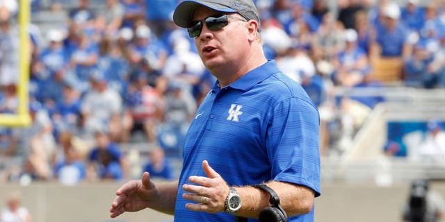 Aug 30, 2014; Lexington, KY, USA; Kentucky Wildcats head coach Mark Stoops reacts during the game against the UT Martin Skyhawks in the second half at Commonwealth Stadium. Kentucky defeated UT Martin 59-14. Mandatory Credit: Mark Zerof-USA TODAY Sports