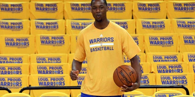 Apr 24, 2014; Oakland, CA, USA; Golden State Warriors forward Harrison Barnes (40) warms up before game three of the first round of the 2014 NBA Playoffs against the Los Angeles Clippers at Oracle Arena. Mandatory Credit: Kelley L Cox-USA TODAY Sports