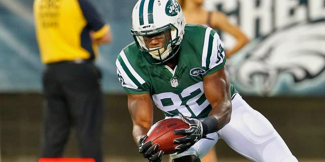 PHILADELPHIA, PA - AUGUST 28: Quincy Enunwa #82 of the New York Jets downs the ball on a punt on the sis years line during a preseason football game against the Philadelphia Eagles at Lincoln Financial Field on August 28, 2014 in Philadelphia, Pennsylvania. (Photo by Rich Schultz /Getty Images)