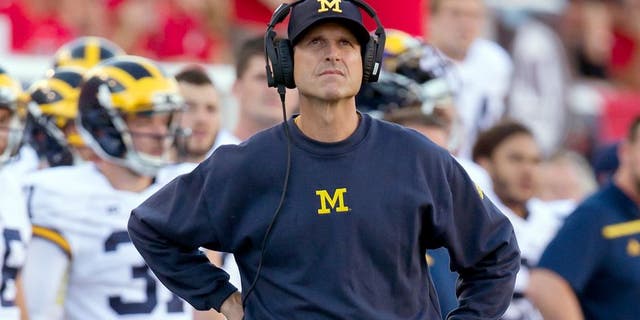 Sep 3, 2015; Salt Lake City, UT, USA; Michigan Wolverines head coach Jim Harbaugh during the first quarter against the Utah Utes at Rice-Eccles Stadium. Mandatory Credit: Russ Isabella-USA TODAY Sports