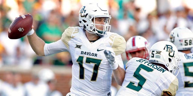 Sep 4, 2015; Dallas, TX, USA; Baylor Bears quarterback Seth Russell (17) throws a pass in the first quarter against the Southern Methodist Mustangs at Gerald J. Ford Stadium. Mandatory Credit: Tim Heitman-USA TODAY Sports