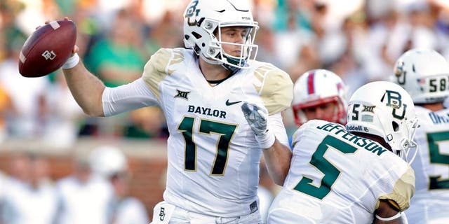 Sep 4, 2015; Dallas, TX, USA; Baylor Bears quarterback Seth Russell (17) throws a pass in the first quarter against the Southern Methodist Mustangs at Gerald J. Ford Stadium. Mandatory Credit: Tim Heitman-USA TODAY Sports