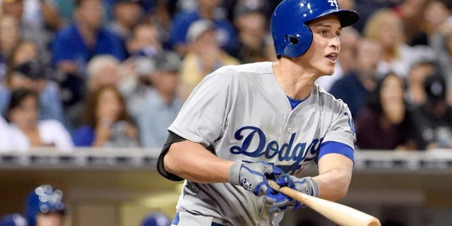 SAN DIEGO, CA - SEPTEMBER 3: Corey Seager #5 of the Los Angeles Dodgers hits a double during the fifth inning of a baseball game against the San Diego Padres at Petco Park September, 3, 2015 in San Diego, California. The hit was Seager's first major league hit. (Photo by Denis Poroy/Getty Images)