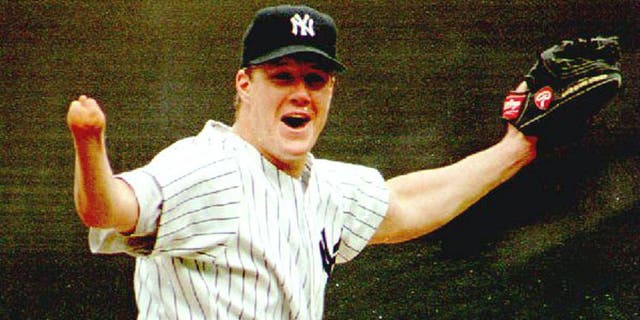 NEW YORK, NY - SEPTEMBER 4: New York Yankees pitcher Jim Abbott celebrates after the last out of New York's first no-hitter in 10 years 04 September 1993. Abbott, who was born without a right hand, walked five and struck out three as the Yankees defeated the Cleveland Indians 4-0. (Photo credit should read MARK D. PHILLIPS/AFP/Getty Images)