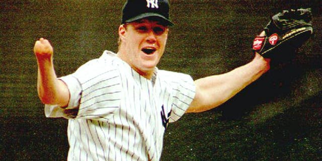 NEW YORK, NY - SEPTEMBER 4: New York Yankees pitcher Jim Abbott celebrates after the last out of New York's first no-hitter in 10 years 04 September 1993. Abbott, who was born without a right hand, walked five and struck out three as the Yankees defeated the Cleveland Indians 4-0. (Photo credit should read MARK D. PHILLIPS/AFP/Getty Images)