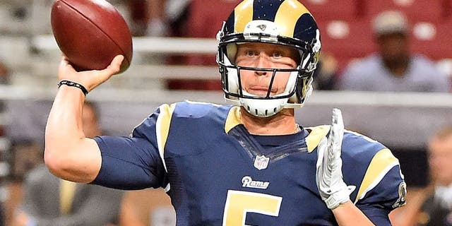 Sep 3, 2015; St. Louis, MO, USA; St. Louis Rams quarterback Nick Foles (5) attempts to pass the ball against the Kansas City Chiefs during the first half at the Edward Jones Dome. Mandatory Credit: Jasen Vinlove-USA TODAY Sports